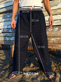 Pantalón Negro de algodón con cordón y patrón de línea